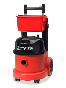 Red Numatic vacuum cleaner with built-in caddy tray for cleaning supplies.