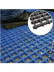 Anti-slip industrial plastic floor grating with debris drainage, shown under safety footwear in a workshop environment.