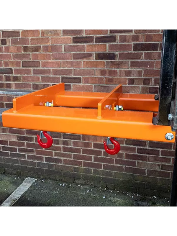 Orange forklift hook attachment with twin swivel lifting hooks for safe material handling and load transport.