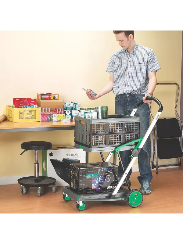 Folding trolley in use indoors, carrying boxes and supplies for light-duty materials handling.