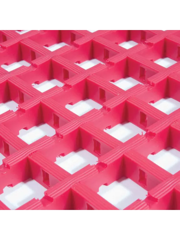Red modular plastic floor grating with open grid design for drainage and slip resistance.