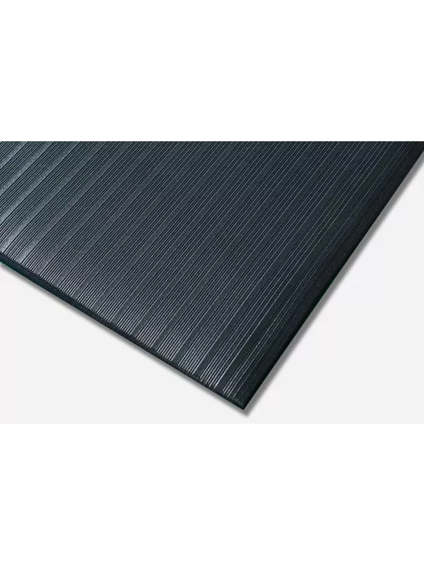 Corner view of black anti-fatigue mat with ribbed surface – cushioned slip-resistant workplace floor mat.