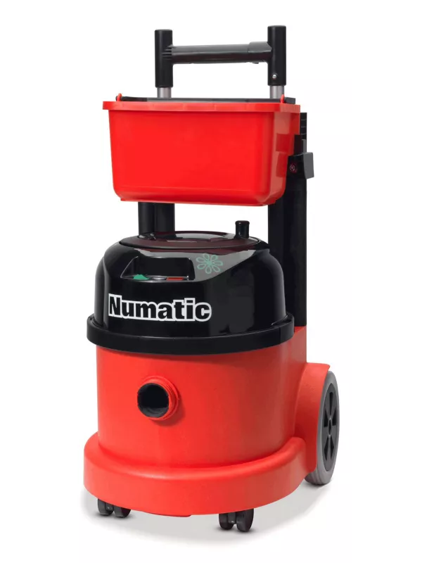 Red Numatic vacuum cleaner with built-in caddy tray for cleaning supplies.