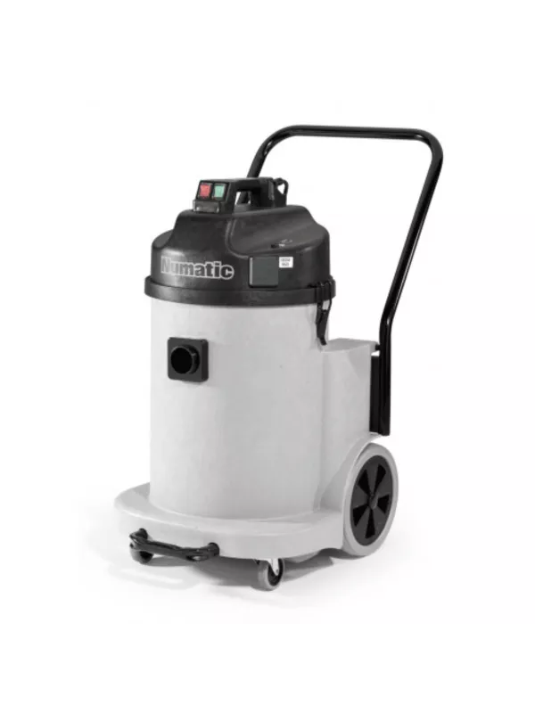 Grey Numatic industrial vacuum cleaner with black top, large rear wheels, and push handle.
