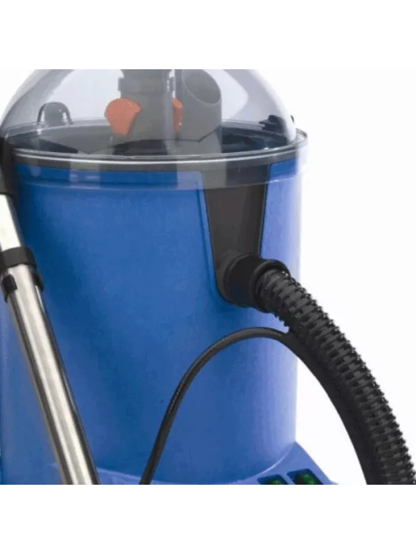 Close-up of the clear domed lid and internal components of the extractor.