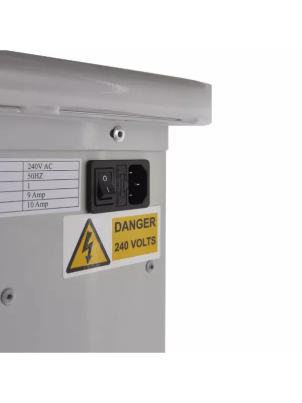 Power inlet and electrical safety warning label on mobile charging trolley.