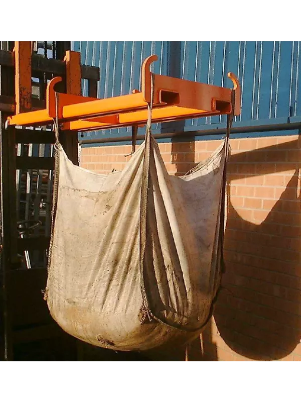 Forklift bulk bag lifting attachment securely carrying a large industrial sack for efficient bulk material transport and storage.