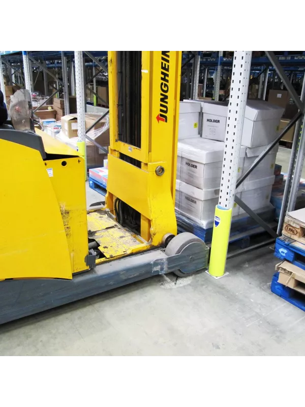 Rack protector shielding a racking upright from impact by a warehouse truck.