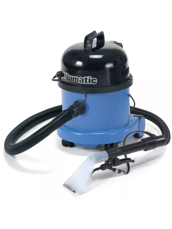 Numatic carpet and upholstery extractor with hose and spray extraction tool attached.