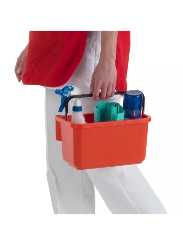 Close-up of the wheeled base and hose attachment points on the Numatic vacuum.