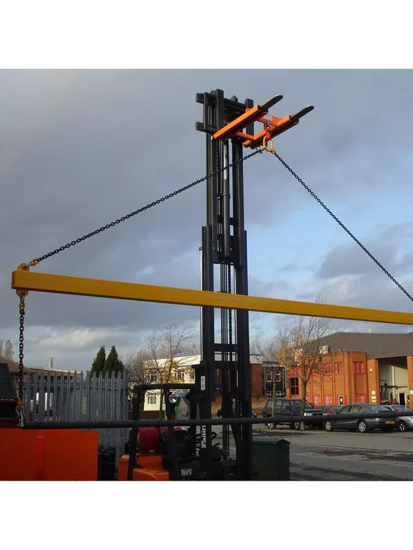 Forklift bulk bag lifter attachment in use, secured with lifting straps on a forklift mast for safe handling of heavy-duty industrial sacks.