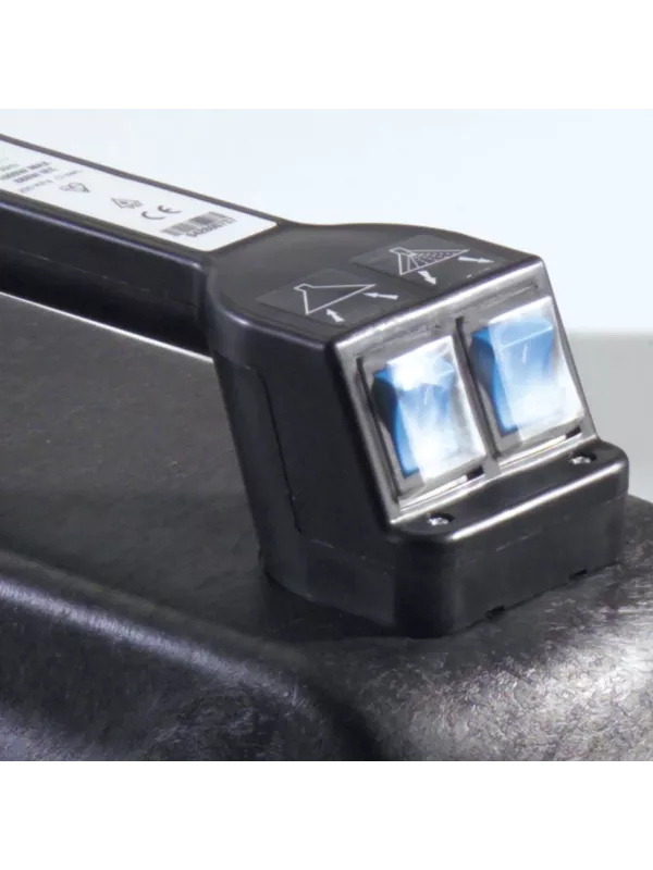 Close-up of the dual-switch control panel on a Numatic extractor vacuum.