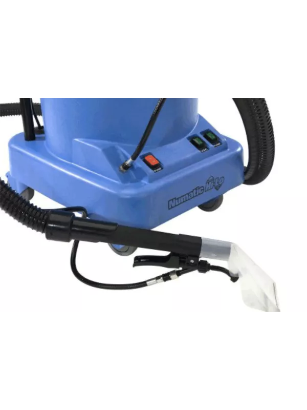 Close-up of the extractor’s spray nozzle and hose at the base of the machine.