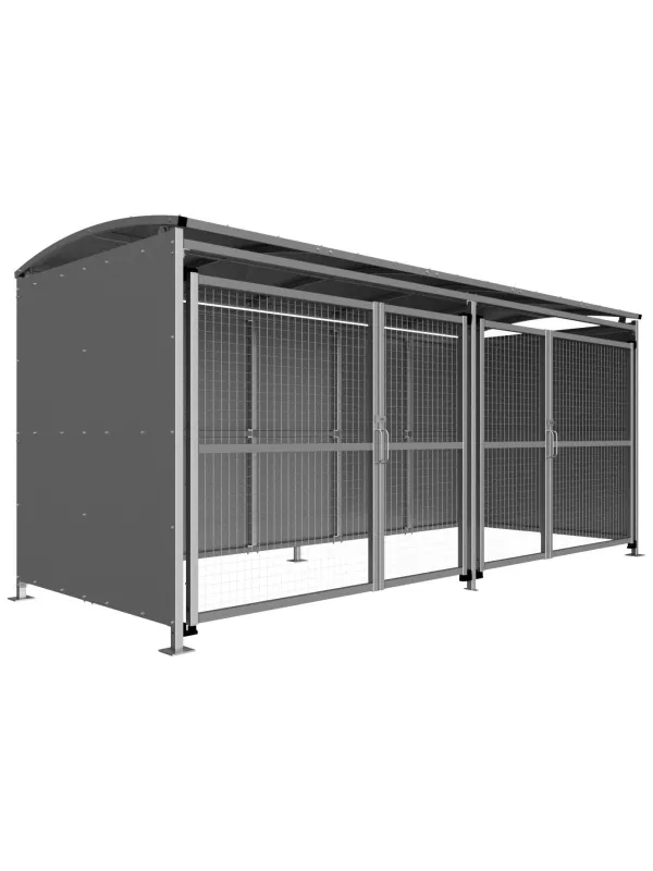 Wide view of steel cycle shelter with mesh panels and curved roof – heavy-duty secure bicycle storage shelter.