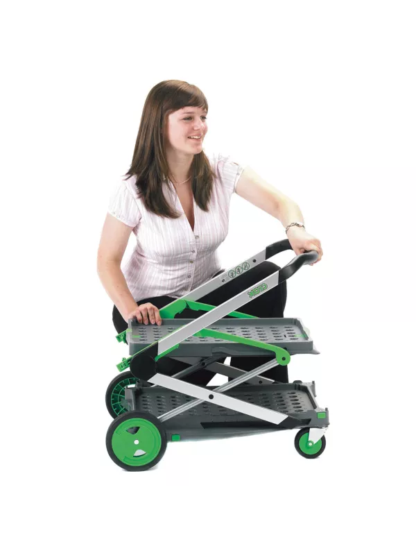 Person using adjustable height folding trolley with crate for transporting goods.