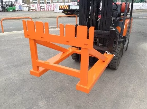 Close-up of forklift wheelie bin lifter attachment – durable orange forklift bin tipper for industrial waste handling.