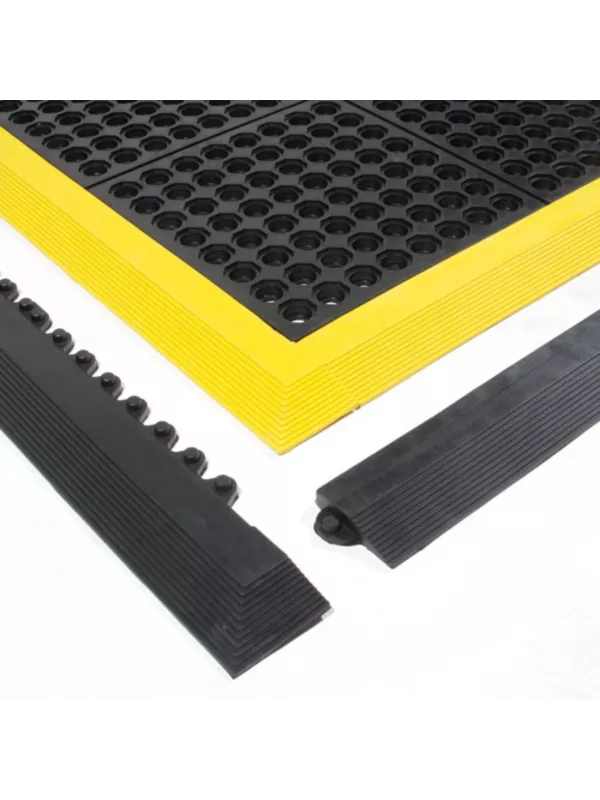Anti-fatigue mat system with interlocking rubber tiles and yellow safety ramp edges
