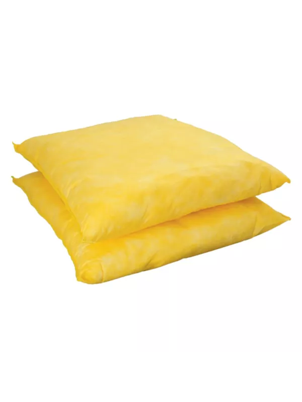 Yellow oil absorbent pillows stacked together for effective spill control and leak containment in industrial environments.