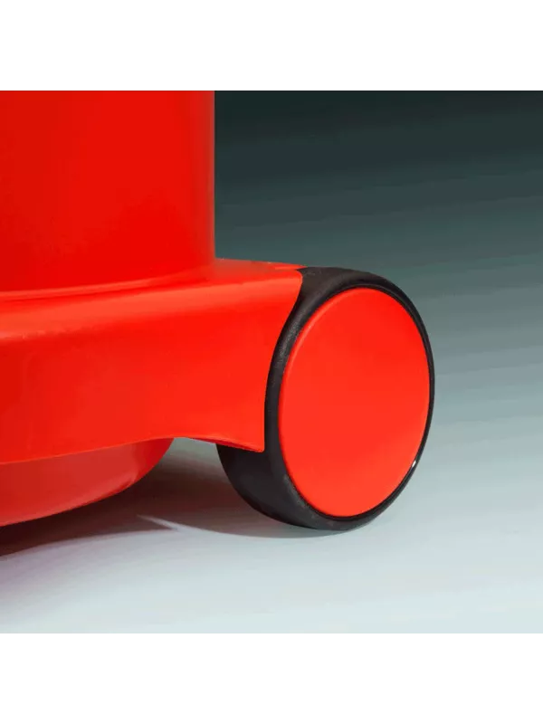 Close-up of the red wheel and base of a Numatic vacuum cleaner.