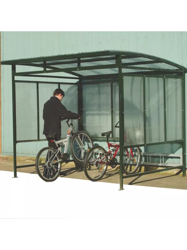 Secure bike shelter with cyclist parking bicycles inside