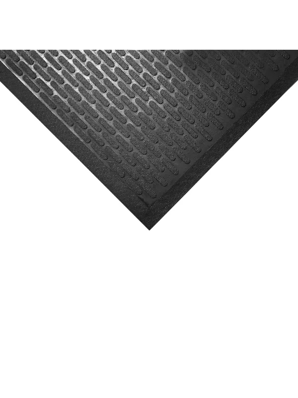 Close-up of anti-slip rubber mat corner highlighting raised tread pattern and durable finish.