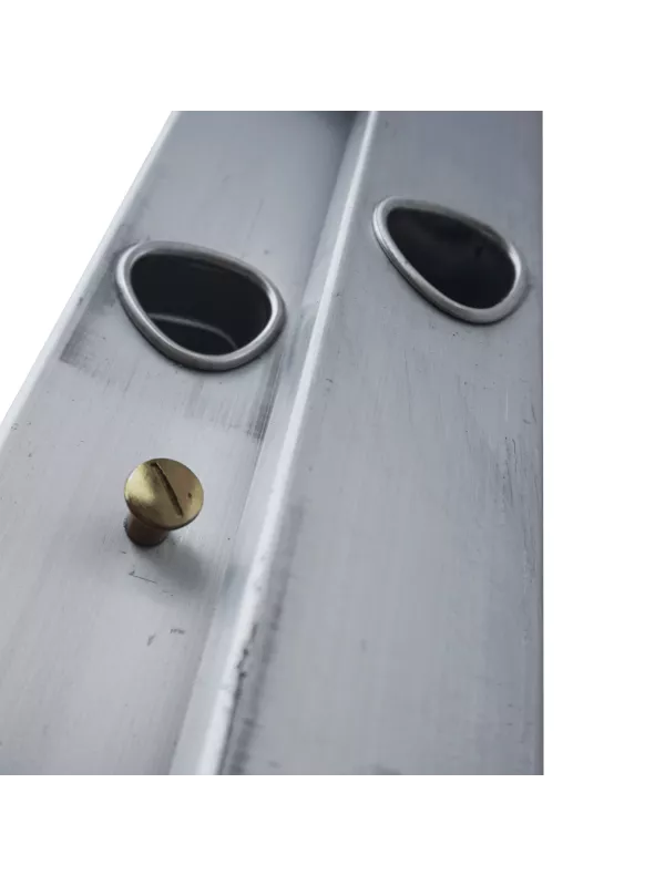 Close-up of ladder side rail with securing bolt