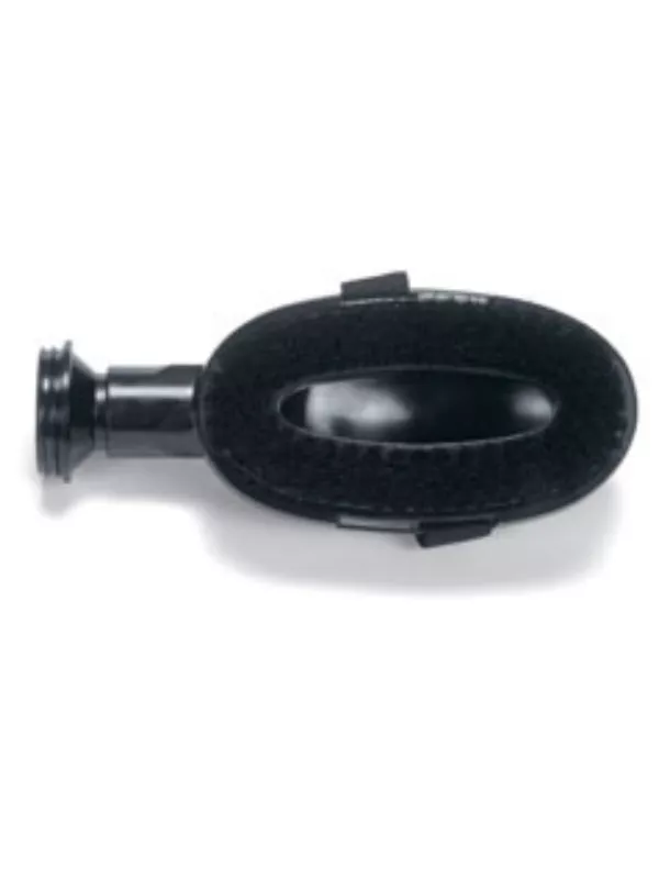 Oval black vacuum grooming attachment with mesh-style surface.