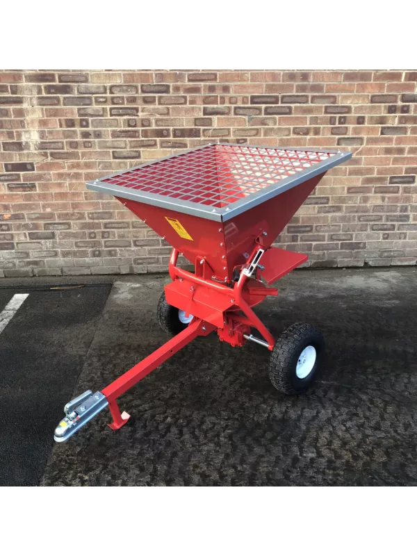 Top view of red fertiliser spreader hopper showing wide opening and durable design for easy bulk material loading.