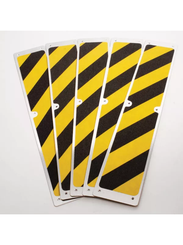 Yellow and black hazard anti-slip stair treads with fixing holes