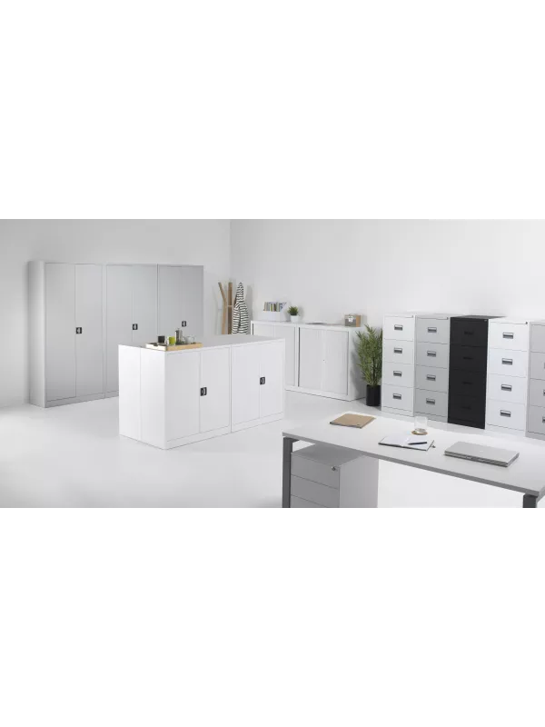 Modern office with multiple white steel storage cupboards and filing cabinets