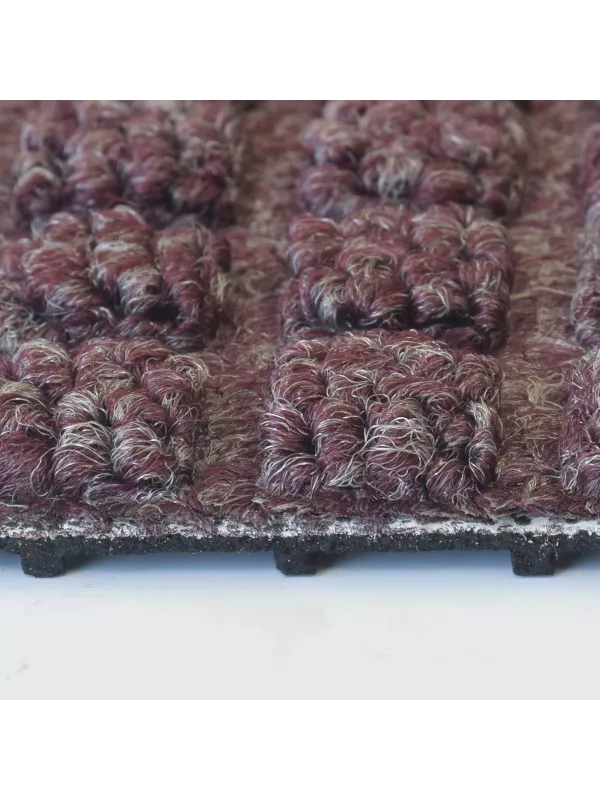 Close-up fibre texture of heavy-duty entrance mat – durable commercial matting for high foot traffic areas.