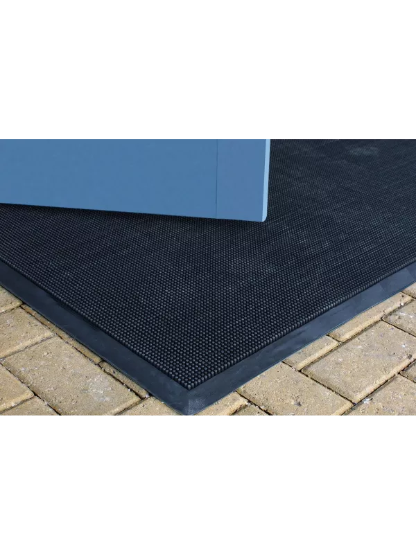 Outdoor entrance mat placed at doorway – slip-resistant floor mat for dirt and moisture control.