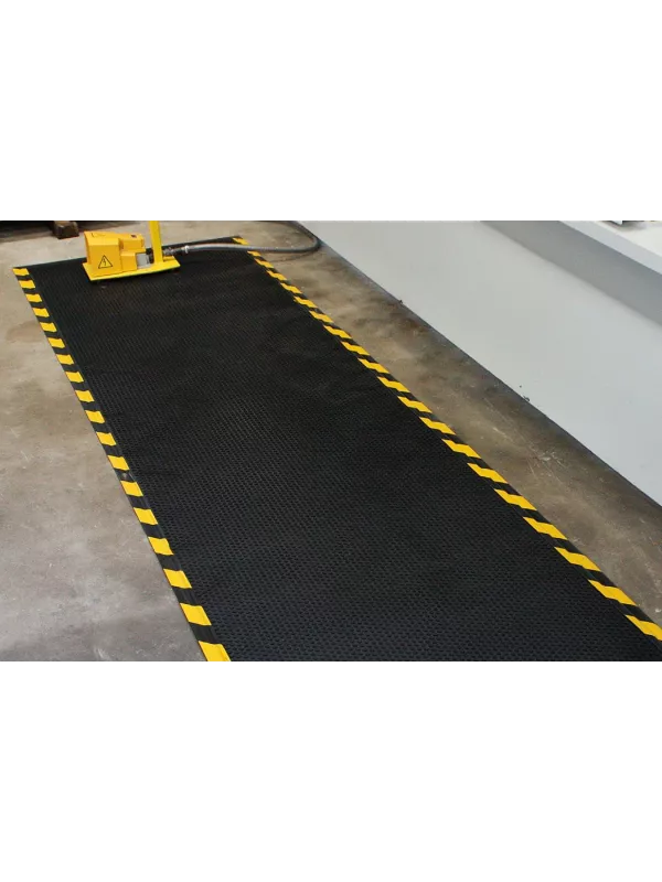 Industrial anti-fatigue mat with yellow safety border – slip-resistant cushioned floor mat for workplace safety.