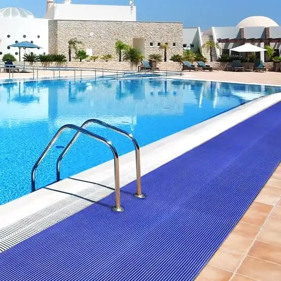 Wet-Area Safety Matting Blue wet-area safety matting installed beside a swimming pool